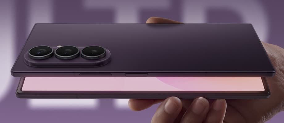 Samsung Galaxy Z Fold8 Ultra held folded and sideways, showing the three rear camera lenses and flash in one island, the hinge along the spine and the inner screen just visible below