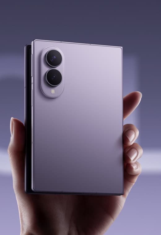 Samsung Galaxy Z Fold8 held folded, back view: the two rear camera lenses and flash in a vertical island, with the hinge running down the left edge