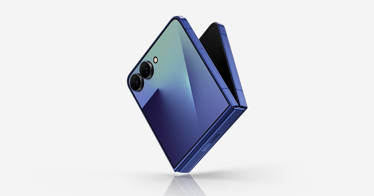 Samsung Galaxy Z Flip7 part-folded, showing the edge-to-edge cover display with the two rear cameras set inside it and the inner screen behind the hinge