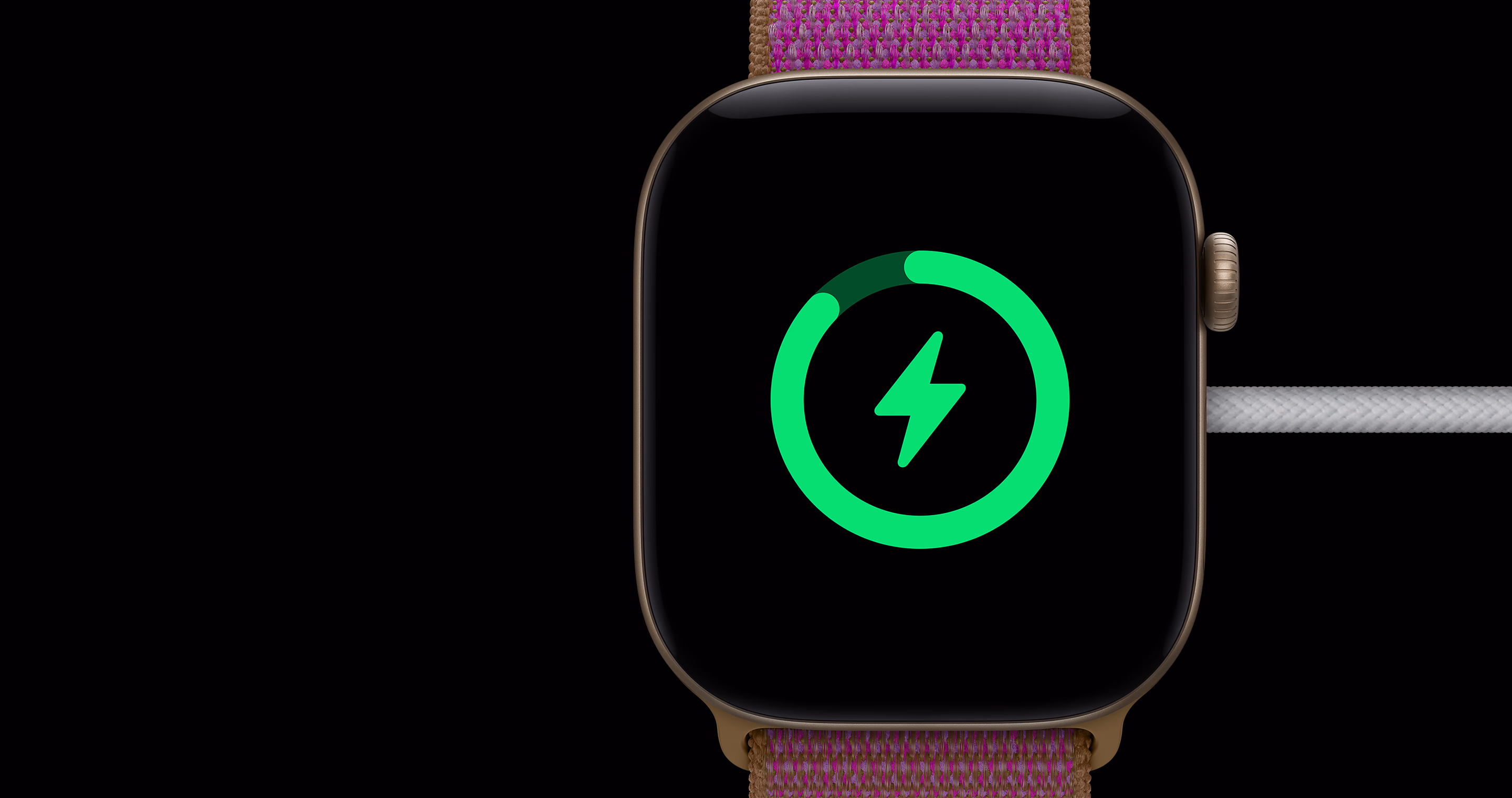 Apple Watch Series 12 charging, showing the green charging indicator on screen