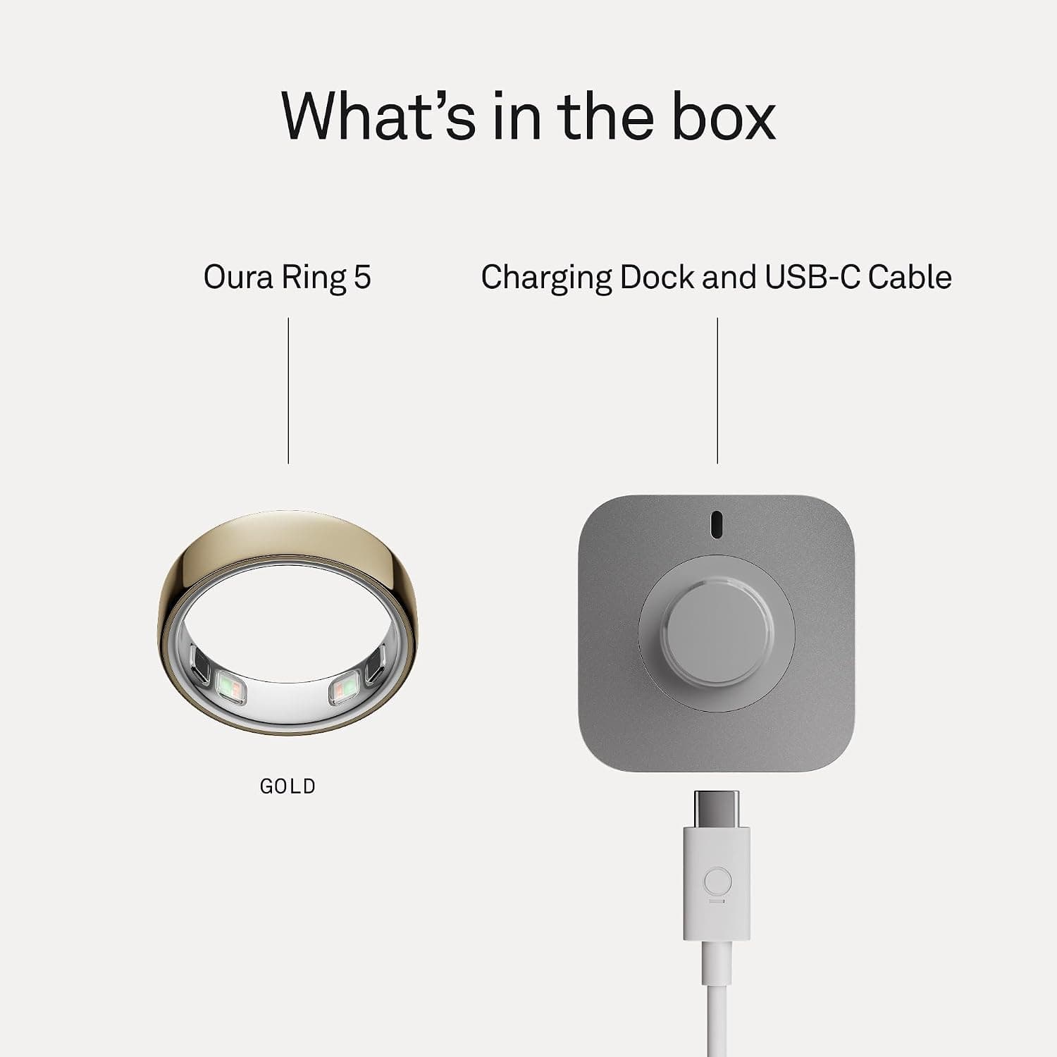 Oura Ring 5 with charging dock and USB-C cable