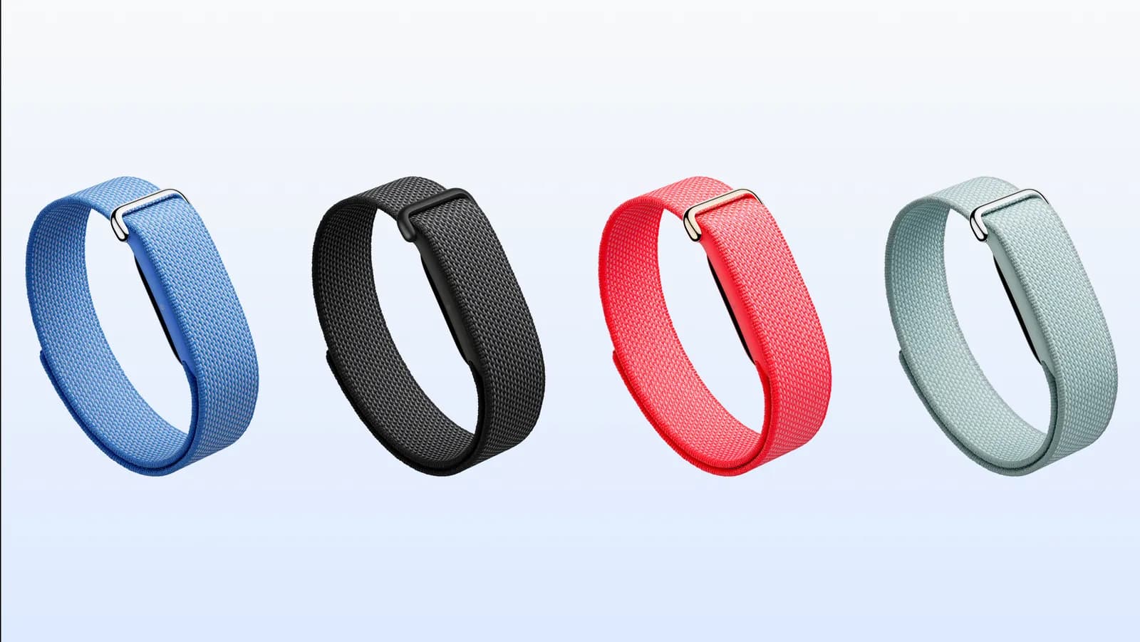 Four Google Fitbit Air trackers with Performance Loop bands in blue, black, red and sage
